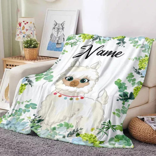 Namensdecke Alpaka mit grünen Pflanzen